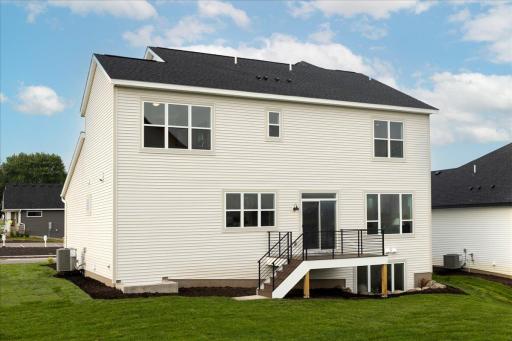 Maintenance free deck with easy access into the kitchen will make entertaining your guests here less of a hassle and have more time to spend together.