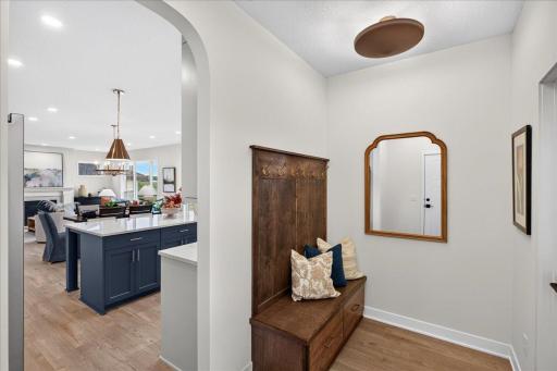 Mudroom off the garage with a large storage closet and 1/2 bath make perfect sense for today's busy lives