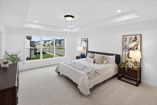 Primary bedroom with plenty of room for those large furniture pieces.