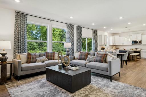 The Great Room features large windows for ample natural light and is the perfect place for gathering with friends and family.