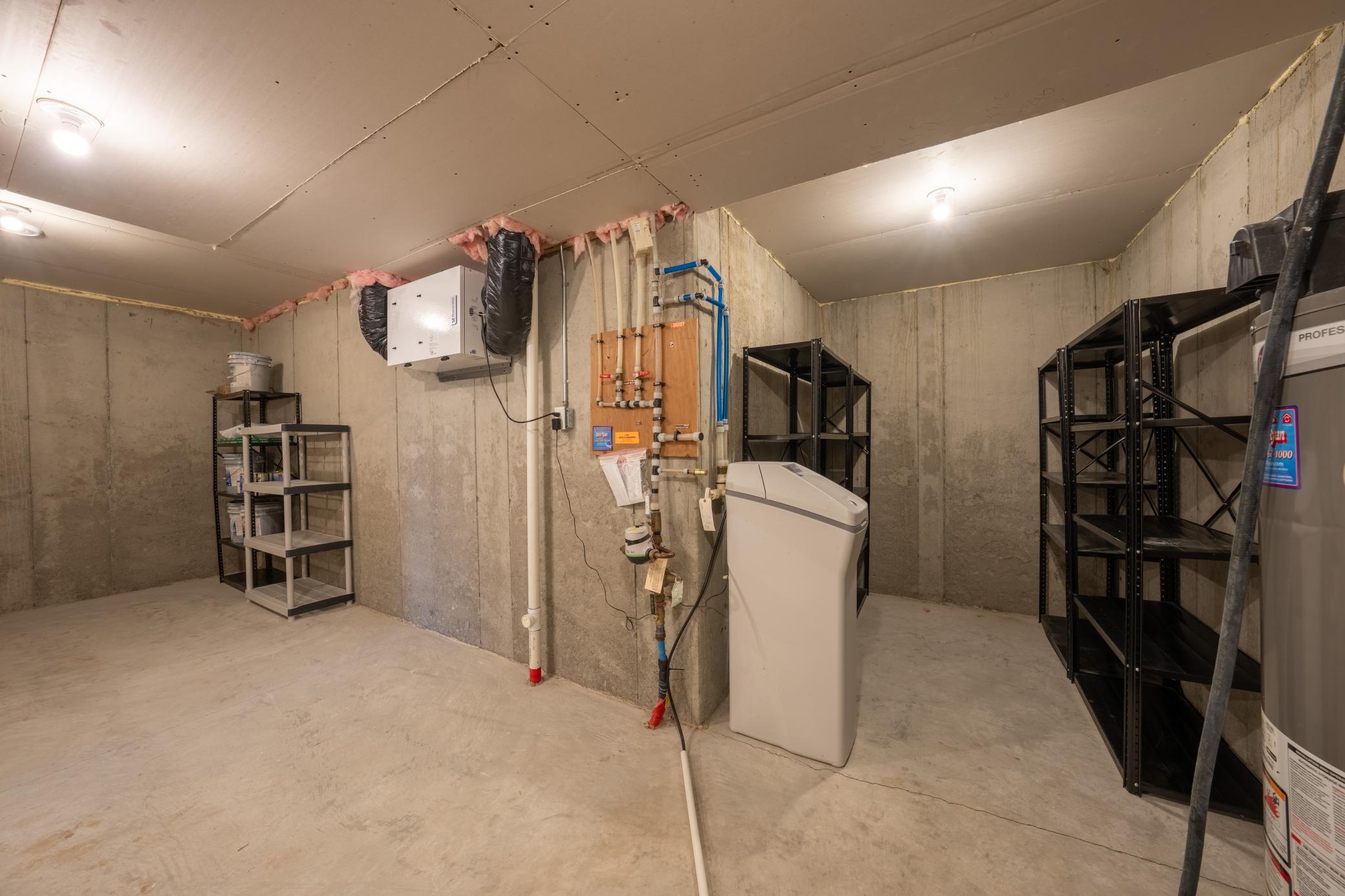 Owned water softener and all shelving is included! Everything is neat, clean, and nicely labeled.