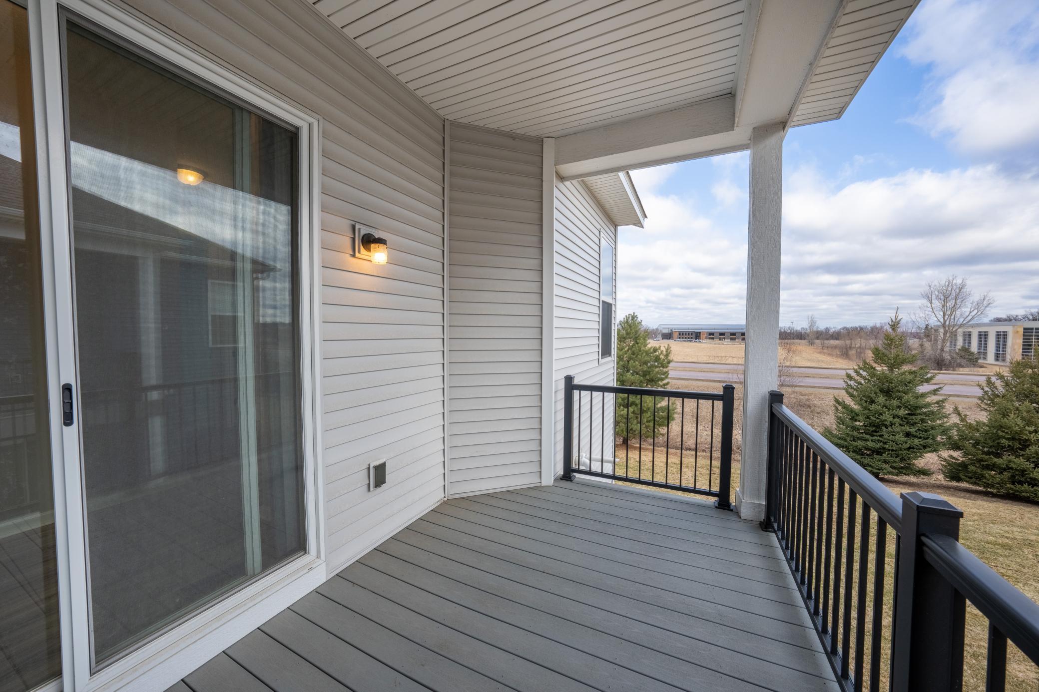 Covered composite deck with scenic views.