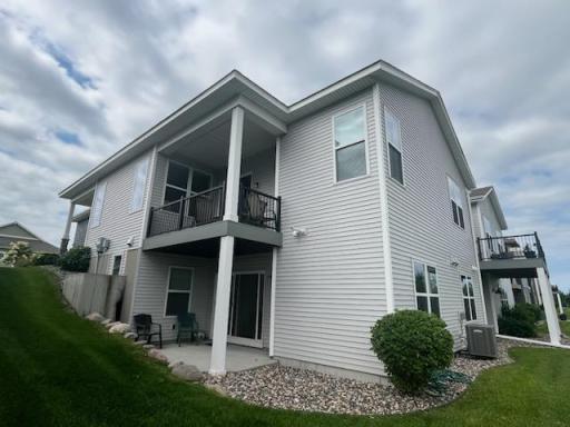 Covered upper deck, walk out lower patio, professional landscaping!