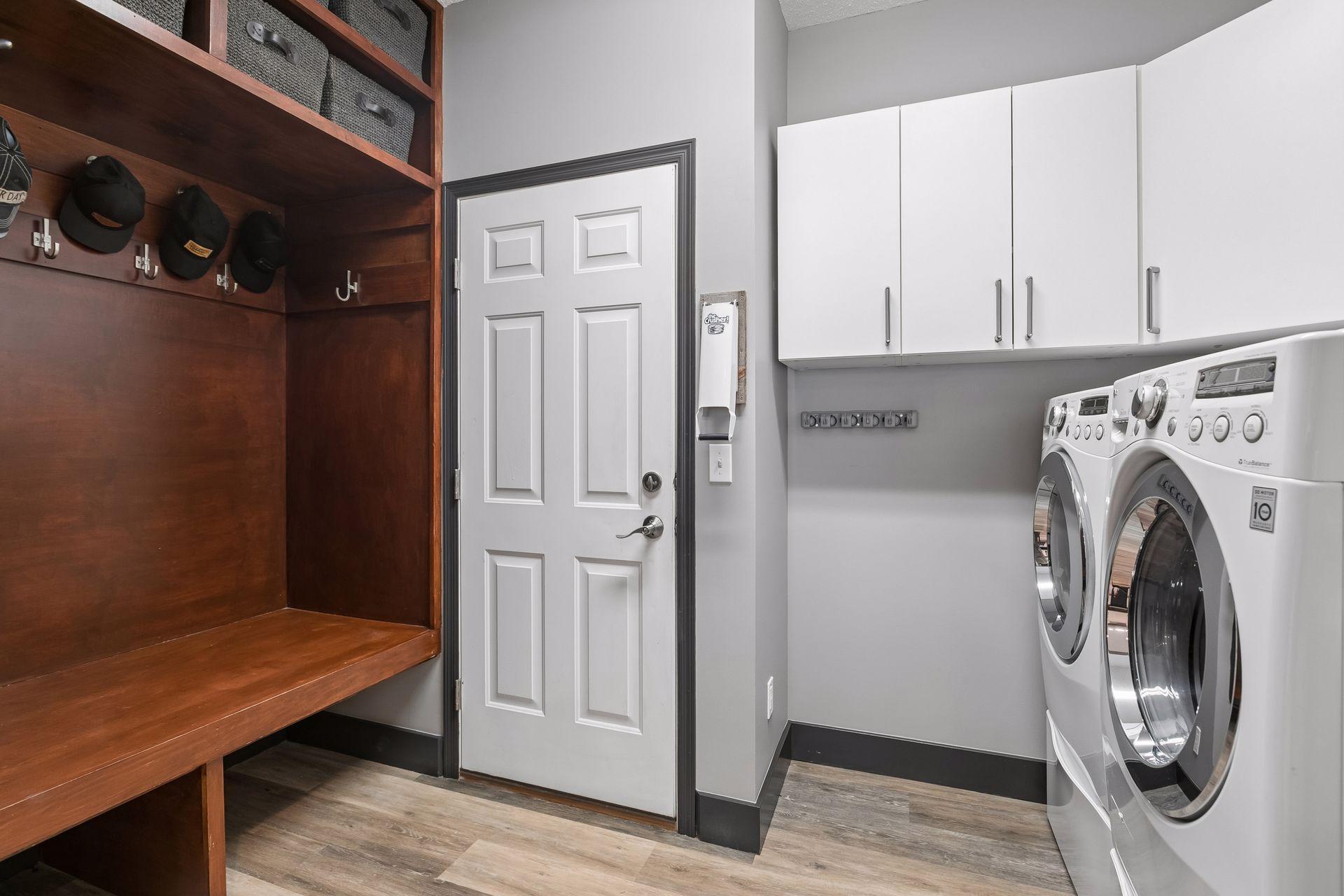 Main floor laundry and mudroom with garage access door visible.