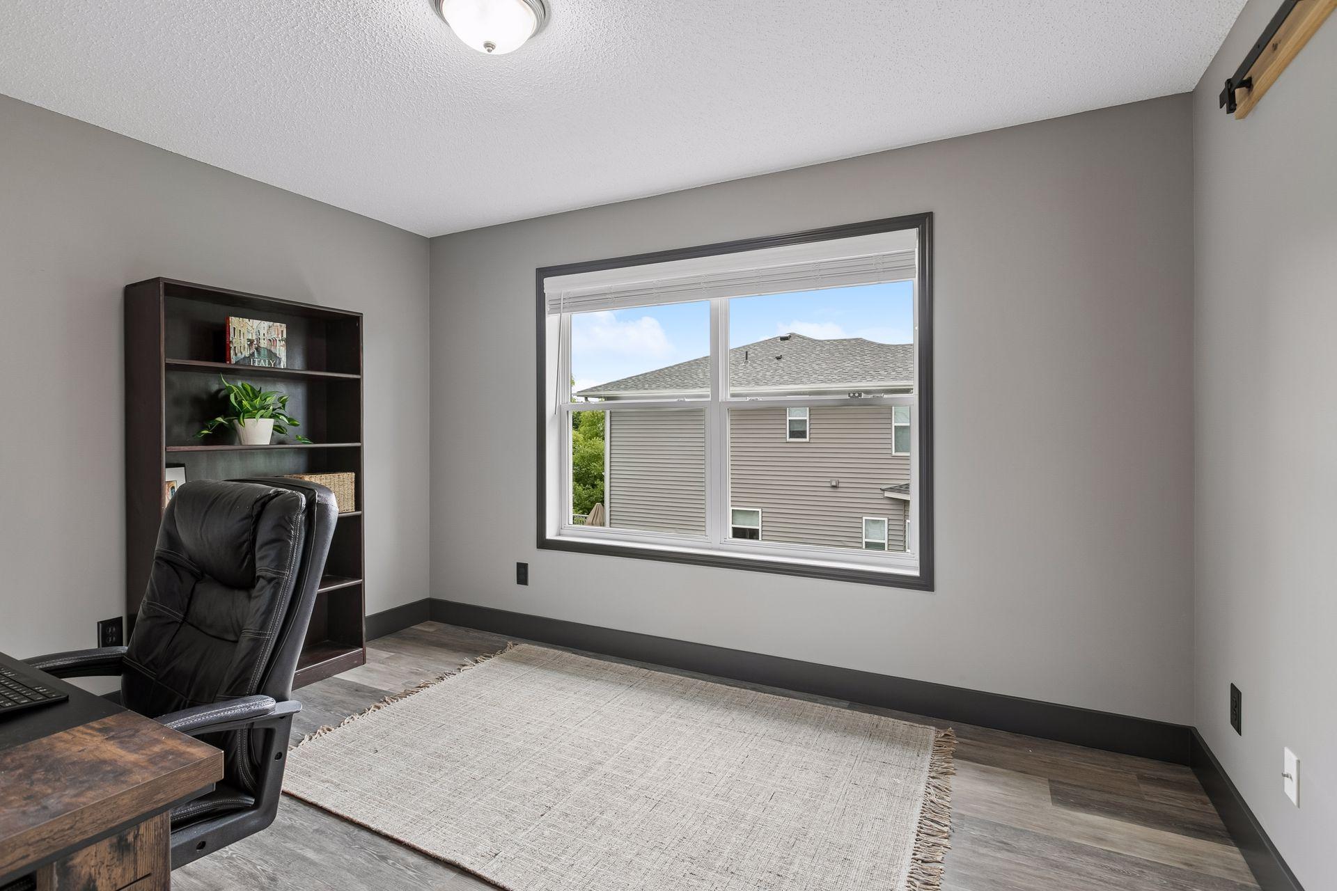 One of four bedrooms on the upper level