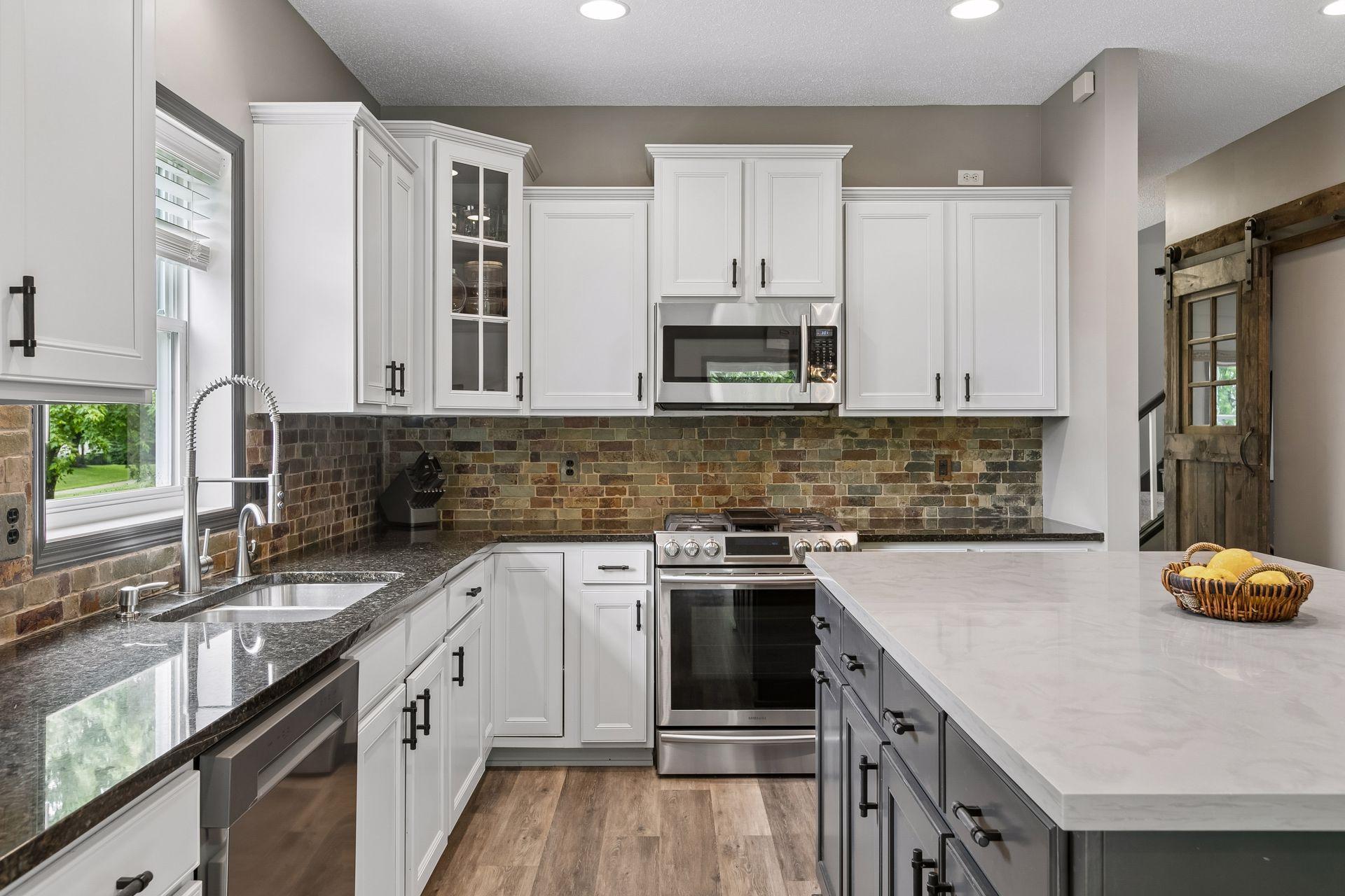 Kitchen with whole-house water filtration system, newer fixtures throughout and a place for everything.