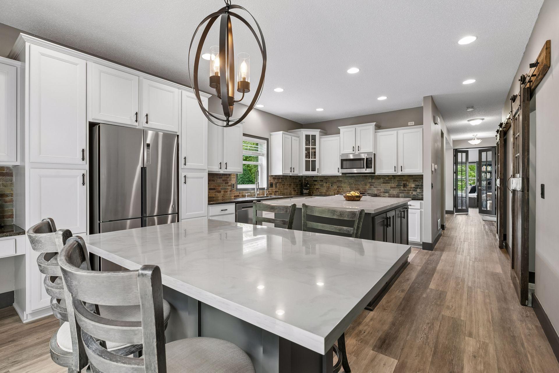 Stunningly remodeled 2008 home in the best school district in MN (Wayzata). Modern farmhouse finishes and stylishly appointed with ideal great room space that flows to the backyard.