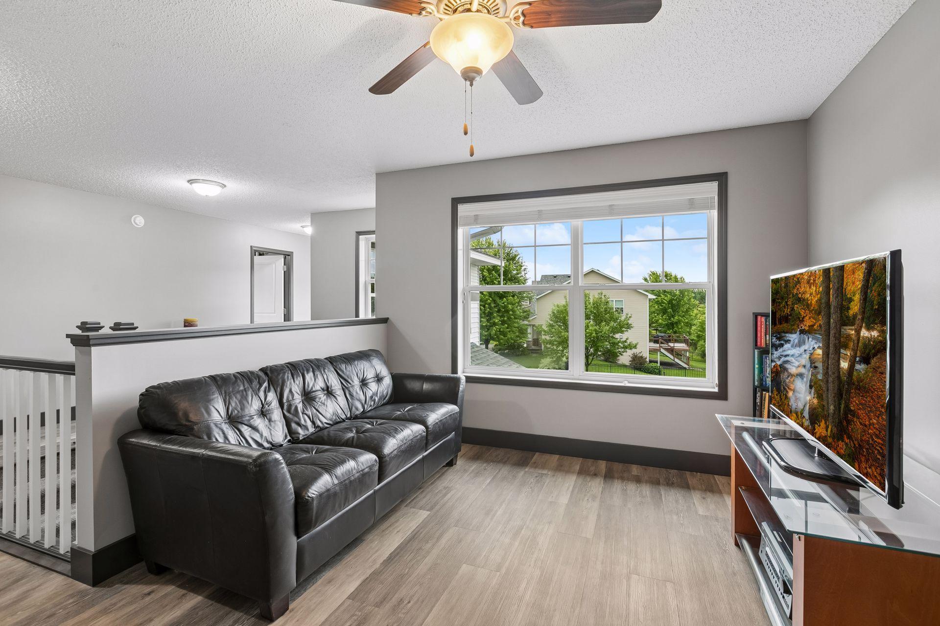 Upper level loft area is a space bonus, with room for family room, gaming area, homework center.
