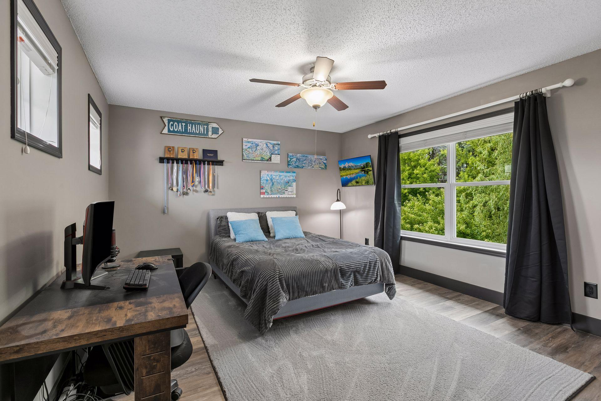 Fourth bedroom over the garage. Oversized space is perfect for a more independent guest, or this could double as another office, rec room area, music space or gym.