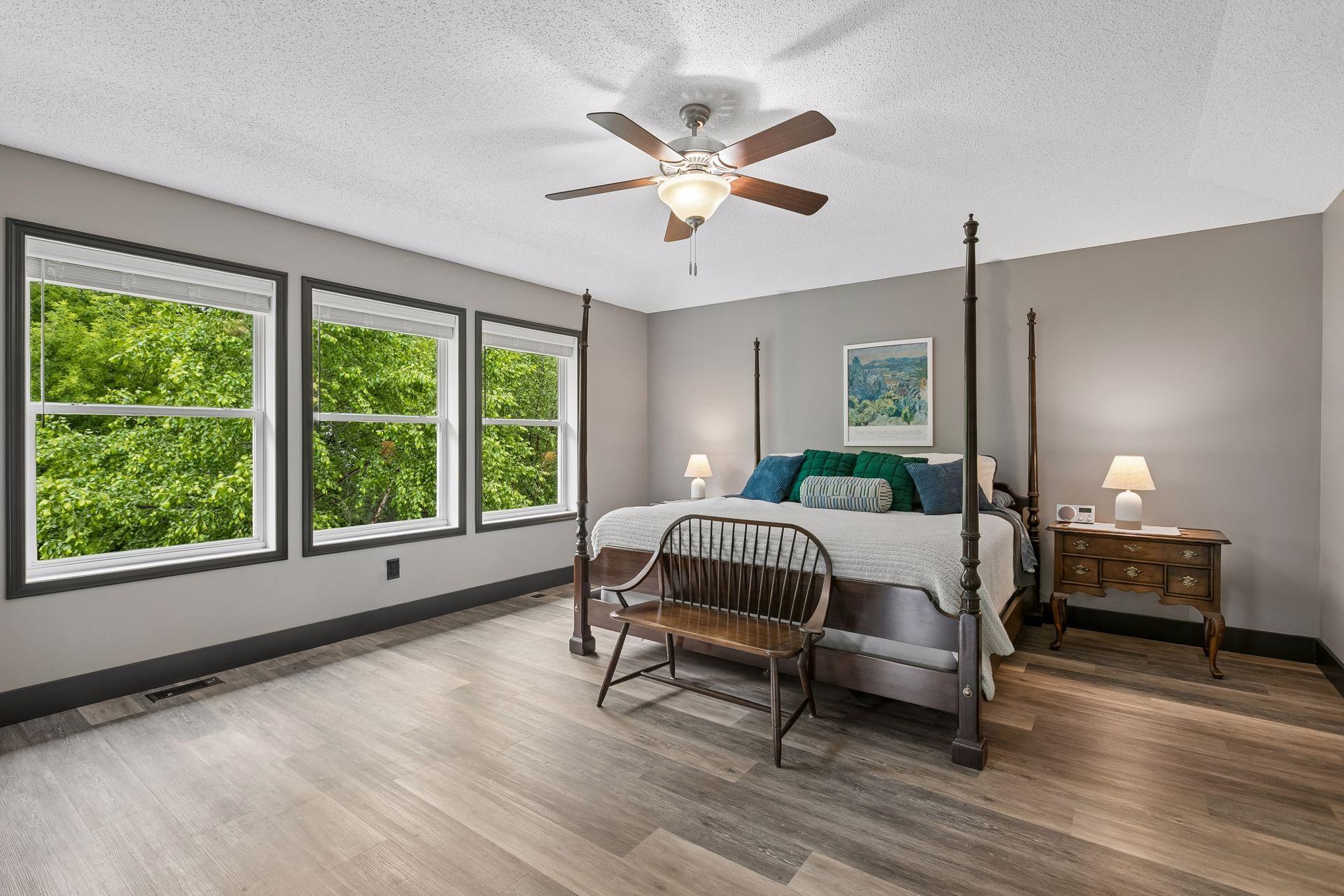 Upstairs, one of four bedrooms - this primary suite has a walk-in closet, and private full bath.