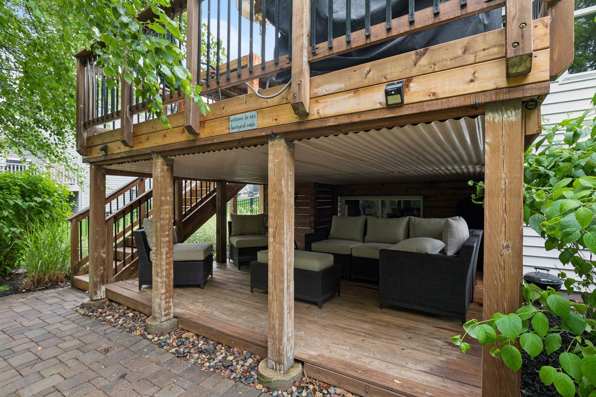 Double-decker deck with level underneath for play area, extra seating, or storage.