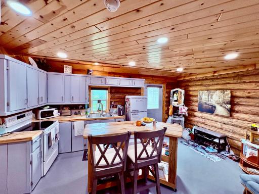 Rolling center island with butcher block top
