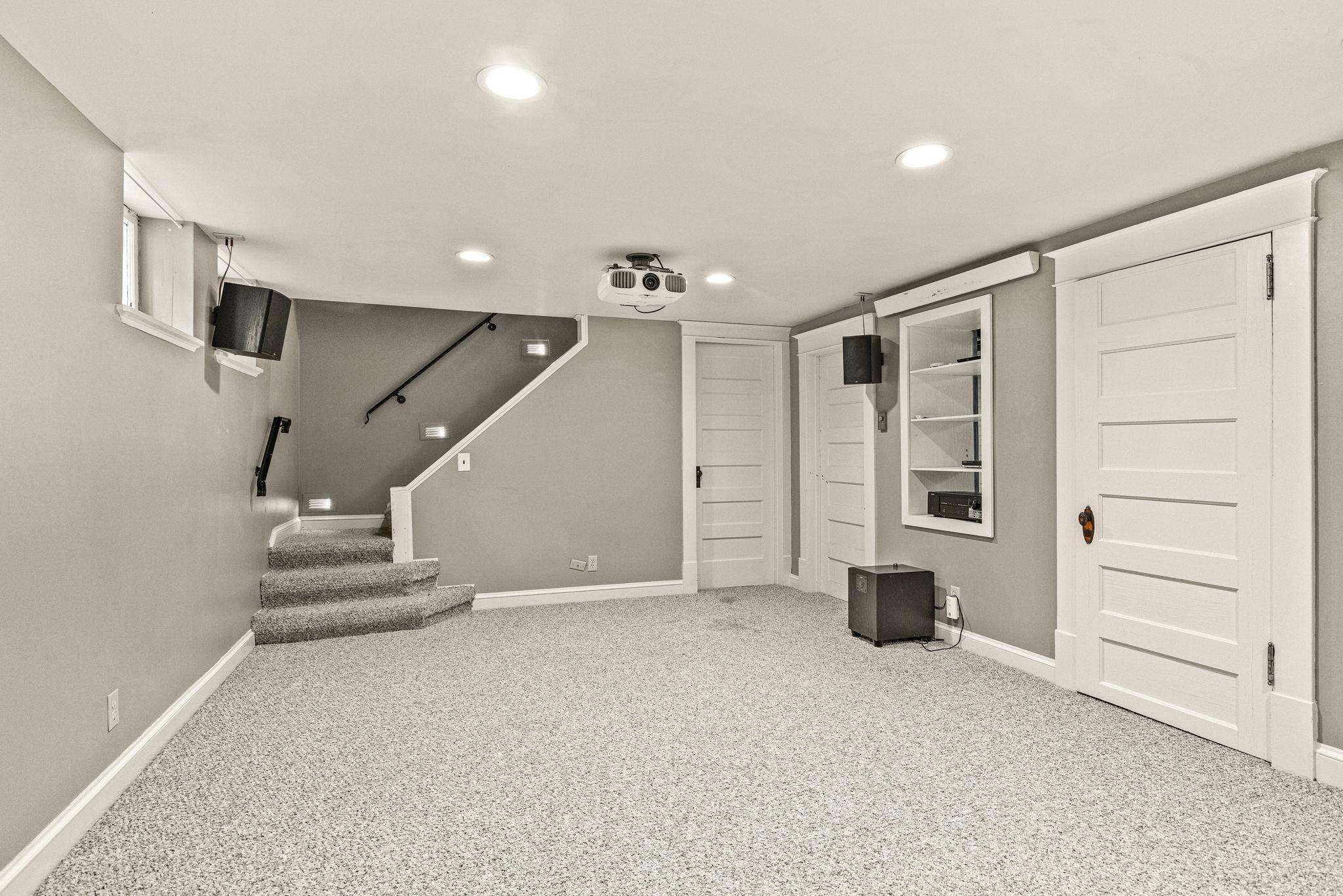 Basement play room with half bath