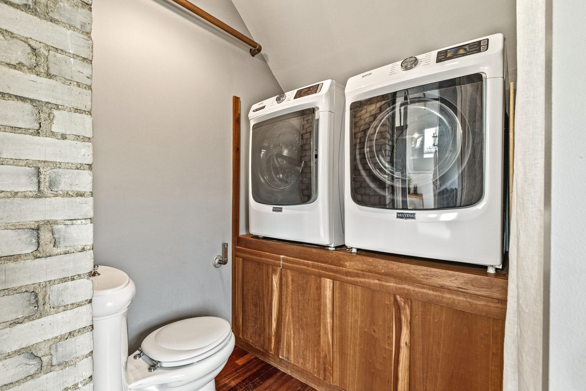 Primary suite private laundry
