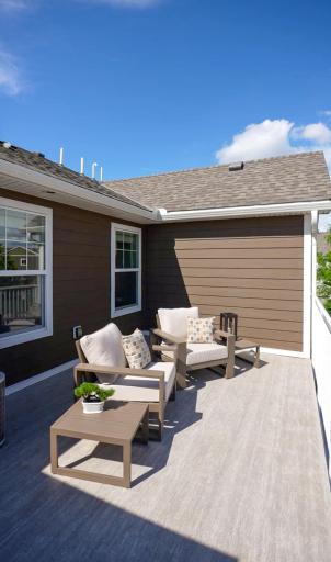 Walk out to the rooftop deck w/ upgraded Dura Deck flooring (recently added for $10K).