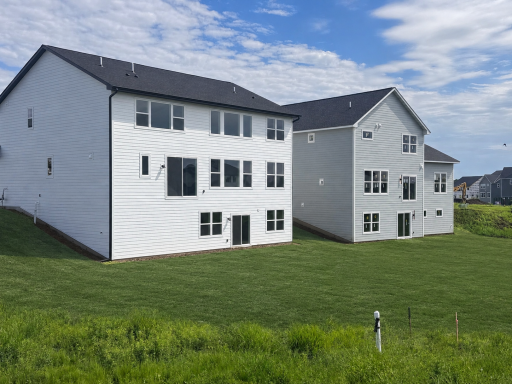 Rear exterior of the home *Photo is virtually staged