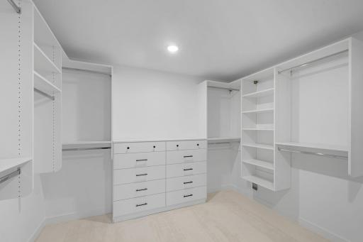 Owner's upgraded closet with built-ins