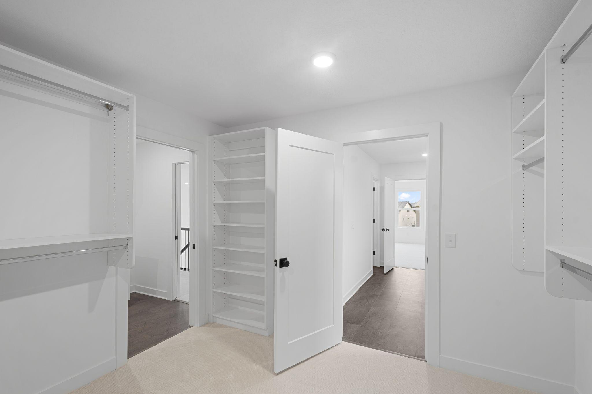 Owner's upgraded closet with built-ins