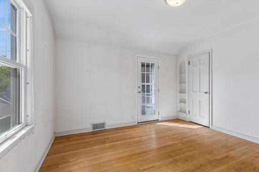 Second bedroom up with door to outside porch