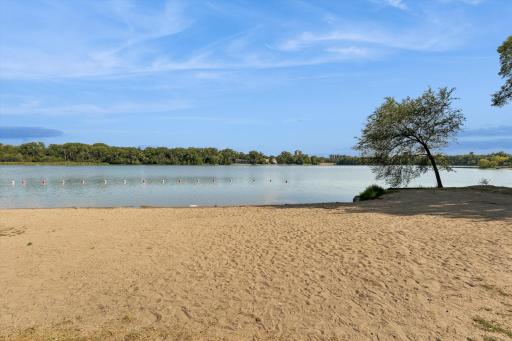 Walk to one of the best beaches in Minnesota on Cedar lake one half block from your front door.