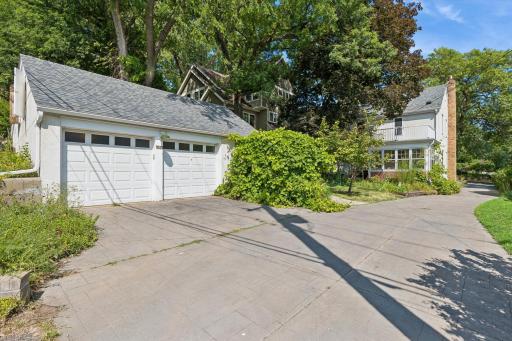 Spacious garage. Stamped driveway from street all the way to rear alley.