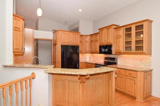 Vaulted & Boasting Tall Custom Cabinetry w/Accent Lighting!