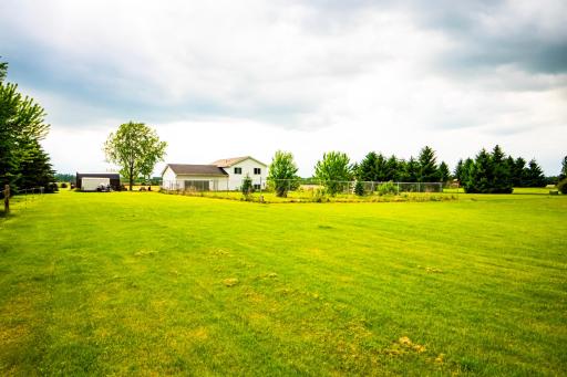 Large back yard with 6' fenced in area
