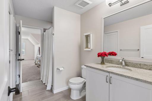 Bathroom for bed 2 & 3 with walk in closet