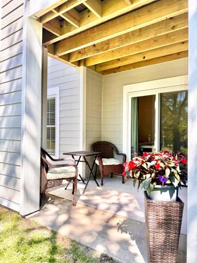 Covered patio off your informal dining area with new sliding glass door and screen.