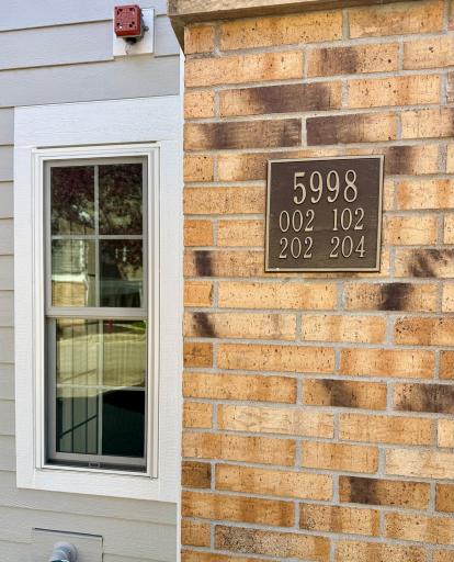 5998 Chasewood Pkwy, Unit 002 - window is looking into private entry area & stairs down to the home.
