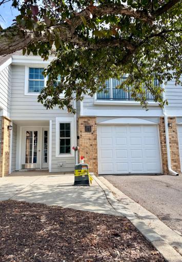 Attached garage with private entry. Unit is downstairs from the entry area.
