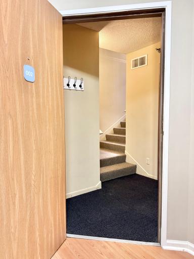 Private entry area to the home with coat hooks; no other units share this entry area.