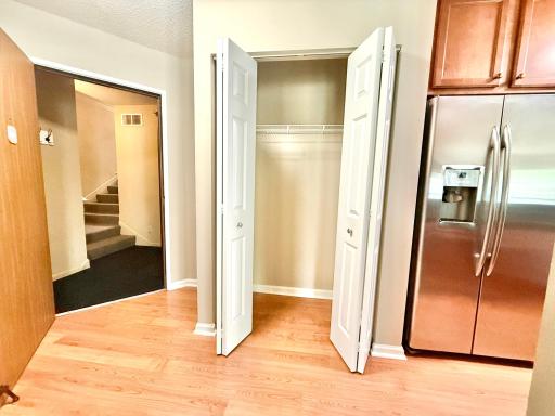 Large closet located between the entry and the kitchen. To the left are bedroom two and the full bathroom.