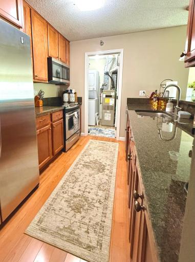 Utility room and laundry with washer & dryer included.