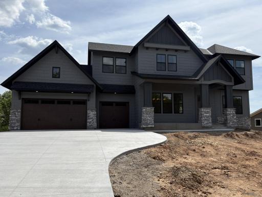 Welcome to 11379 Masters St N! (Photo is of the actual home.)