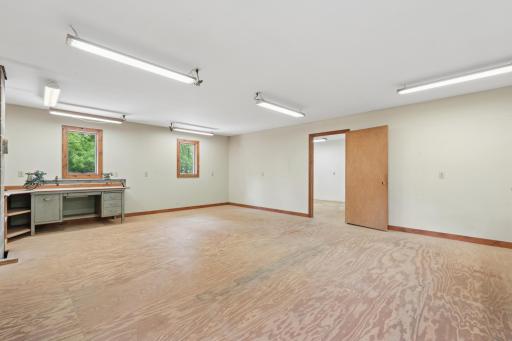 The upper level shop area of the detached garage. Tons of options for this space!