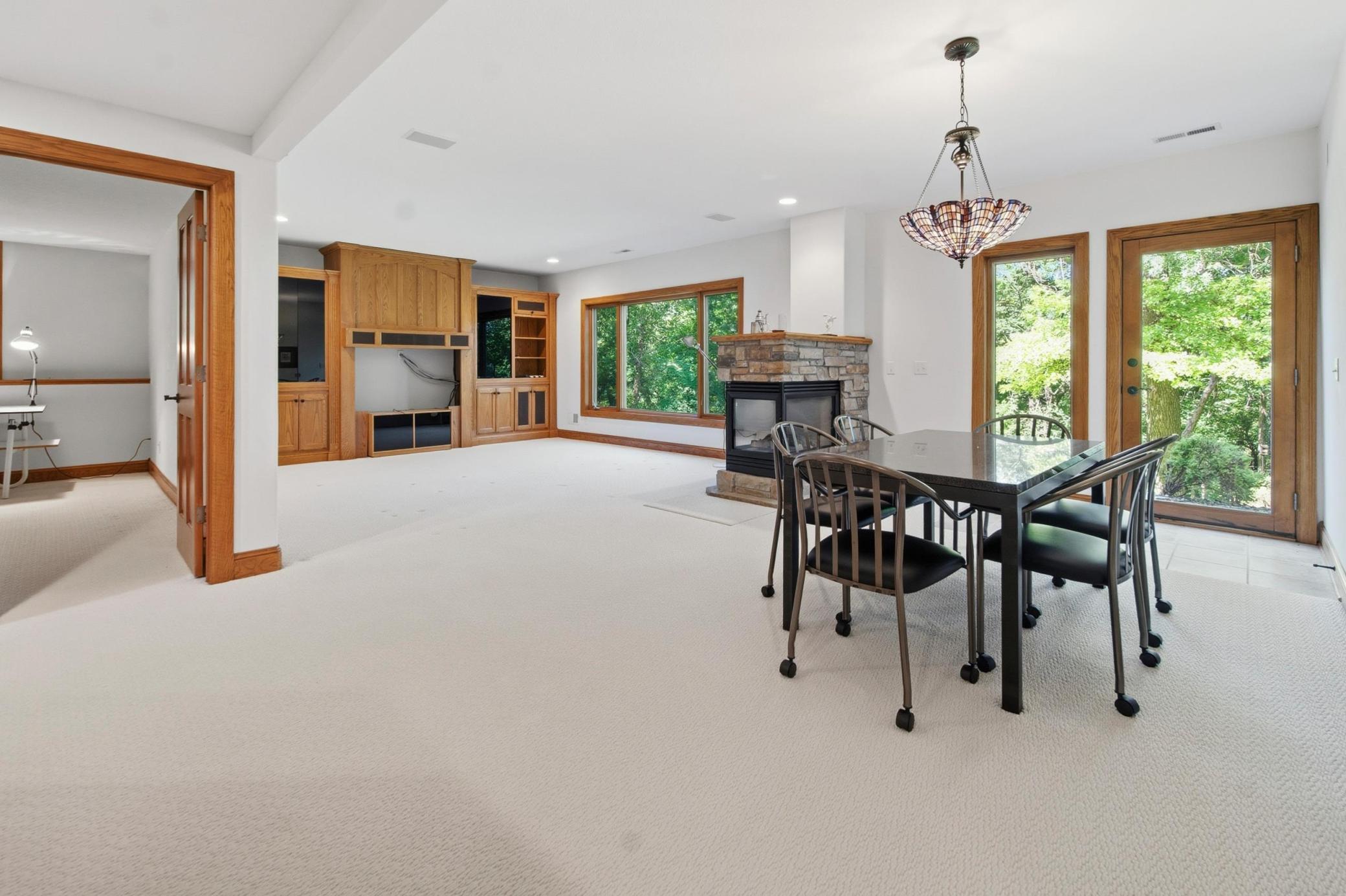 Walkout Lower Level Large 2nd Family Room with a Gas Fireplace & Dining Area