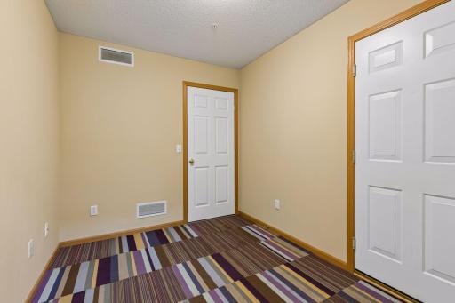 LOWER LEVEL ACESS TO GARAGE AND UTILITY ROOM