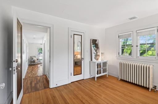 Private primary retreat with direct access to the adjoining flex space.