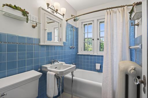 Classic full bath featuring vintage charm and timeless appeal.