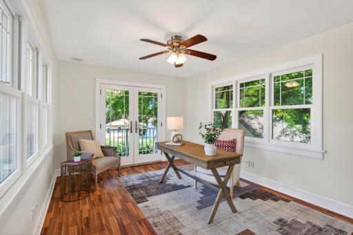 Sunlit flex space ideal for a home office, library, sitting room, or creative studio.