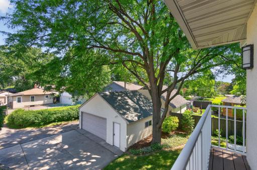 Peaceful views overlooking the mature trees and private backyard below.