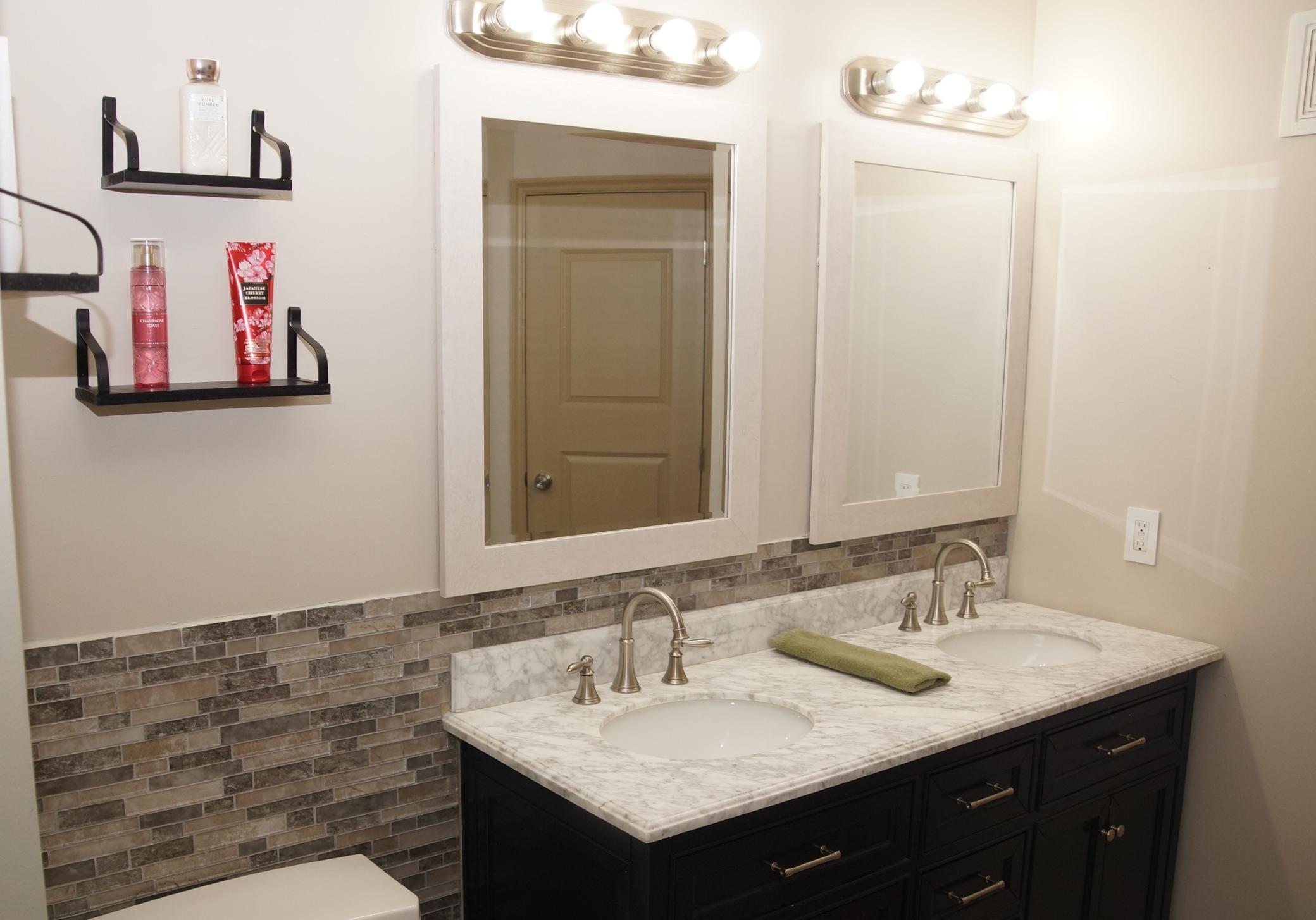 Main floor full bath features a double sink vanity!
