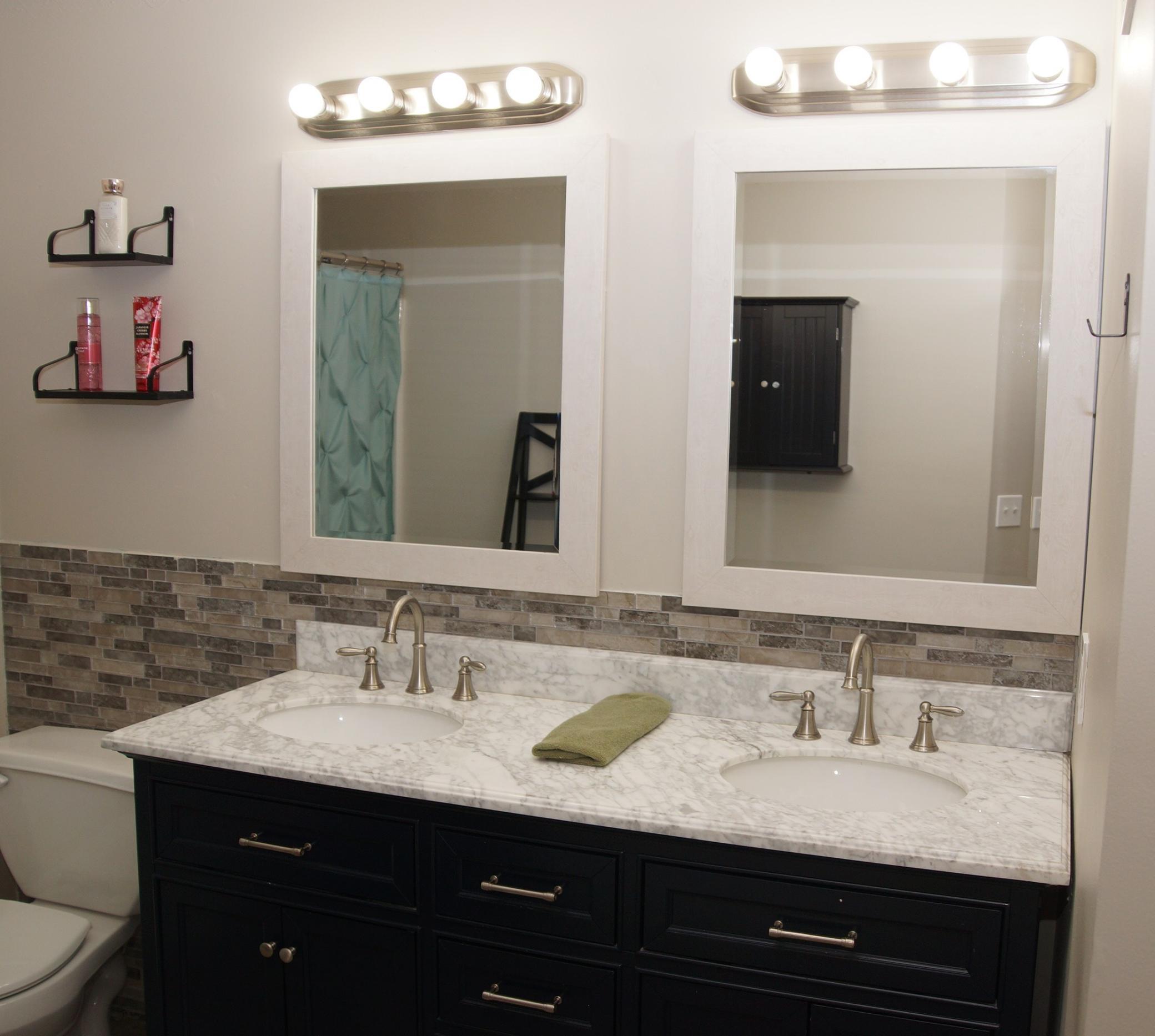 Main floor full bath features a double sink vanity!