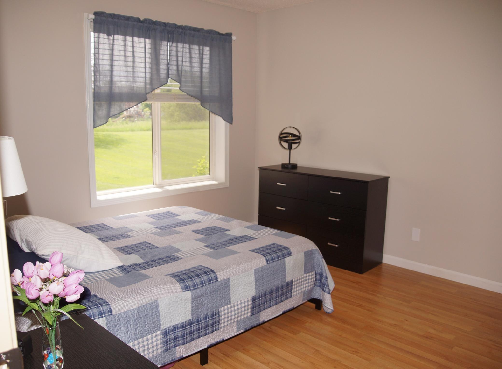 Bedroom 1 looks out over green space!