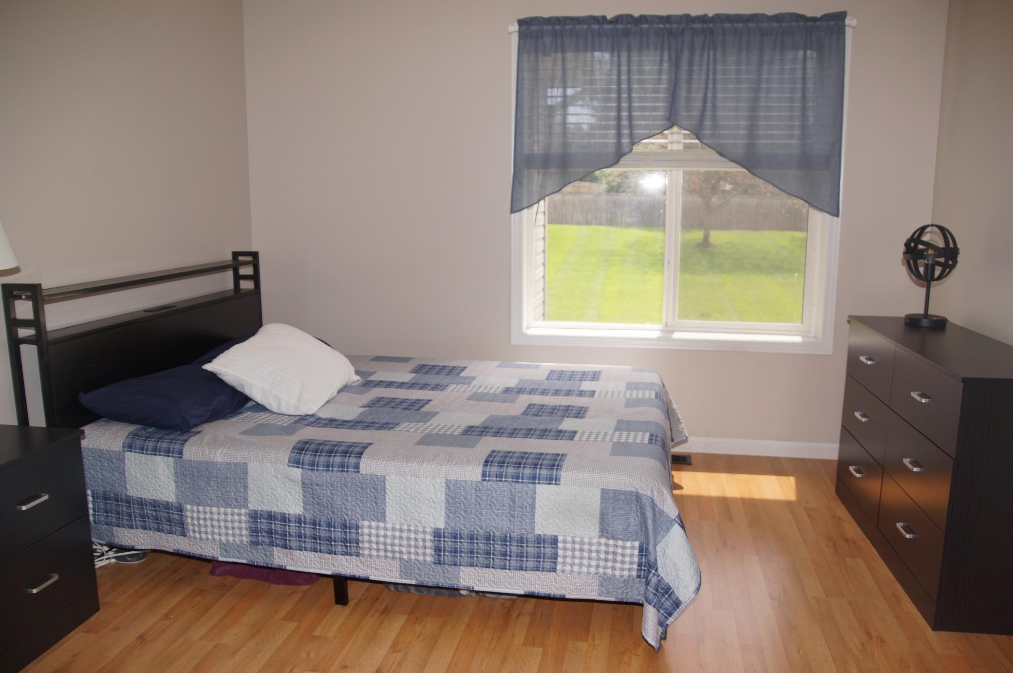Bedroom 1 looks out over green space!