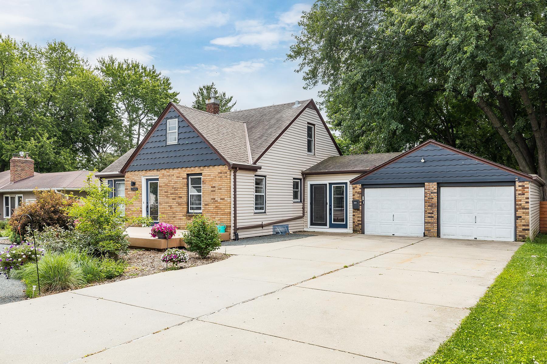 Two car attached garage and large driveway offer lots of parking