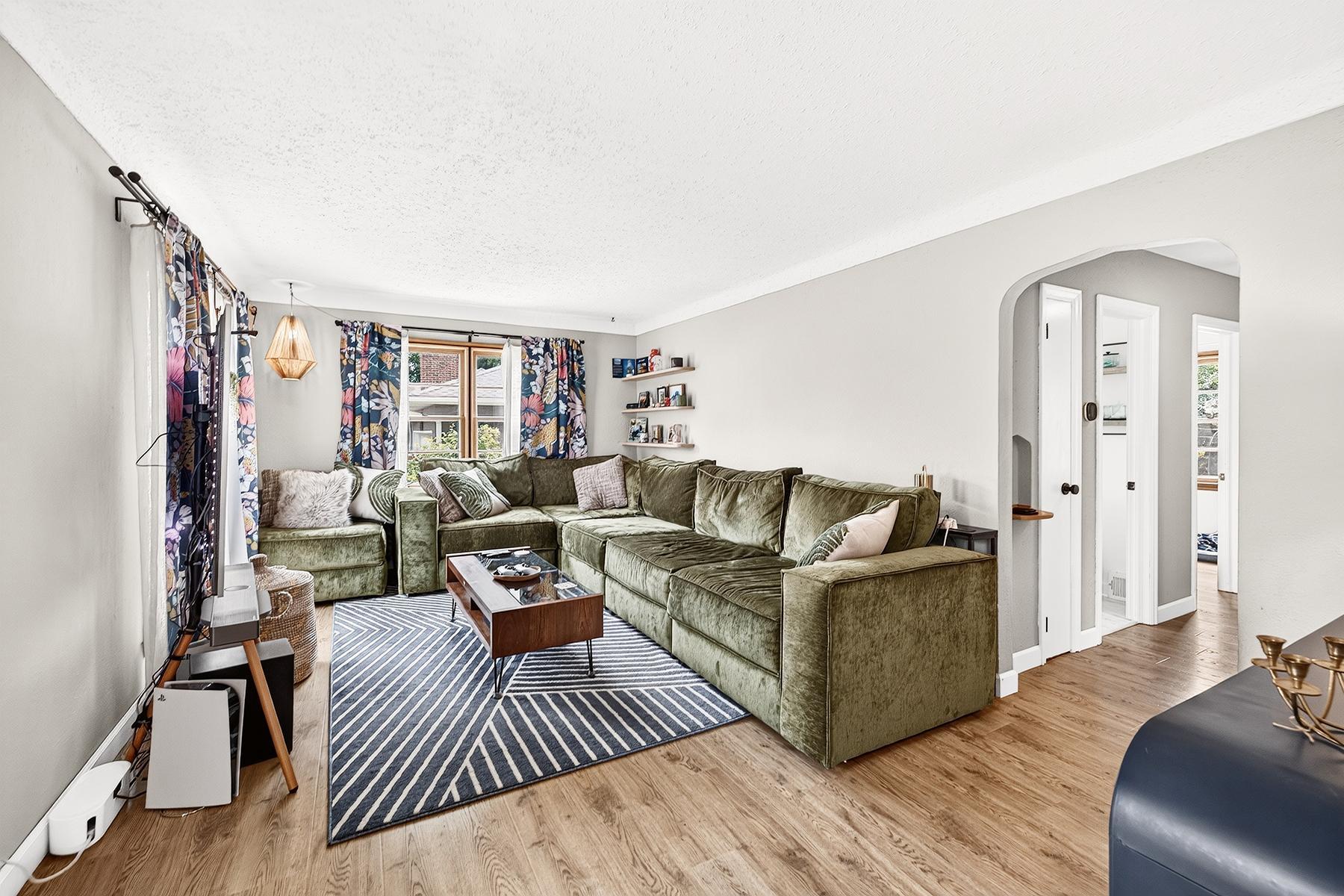 Beautiful wood floors run throughout main level