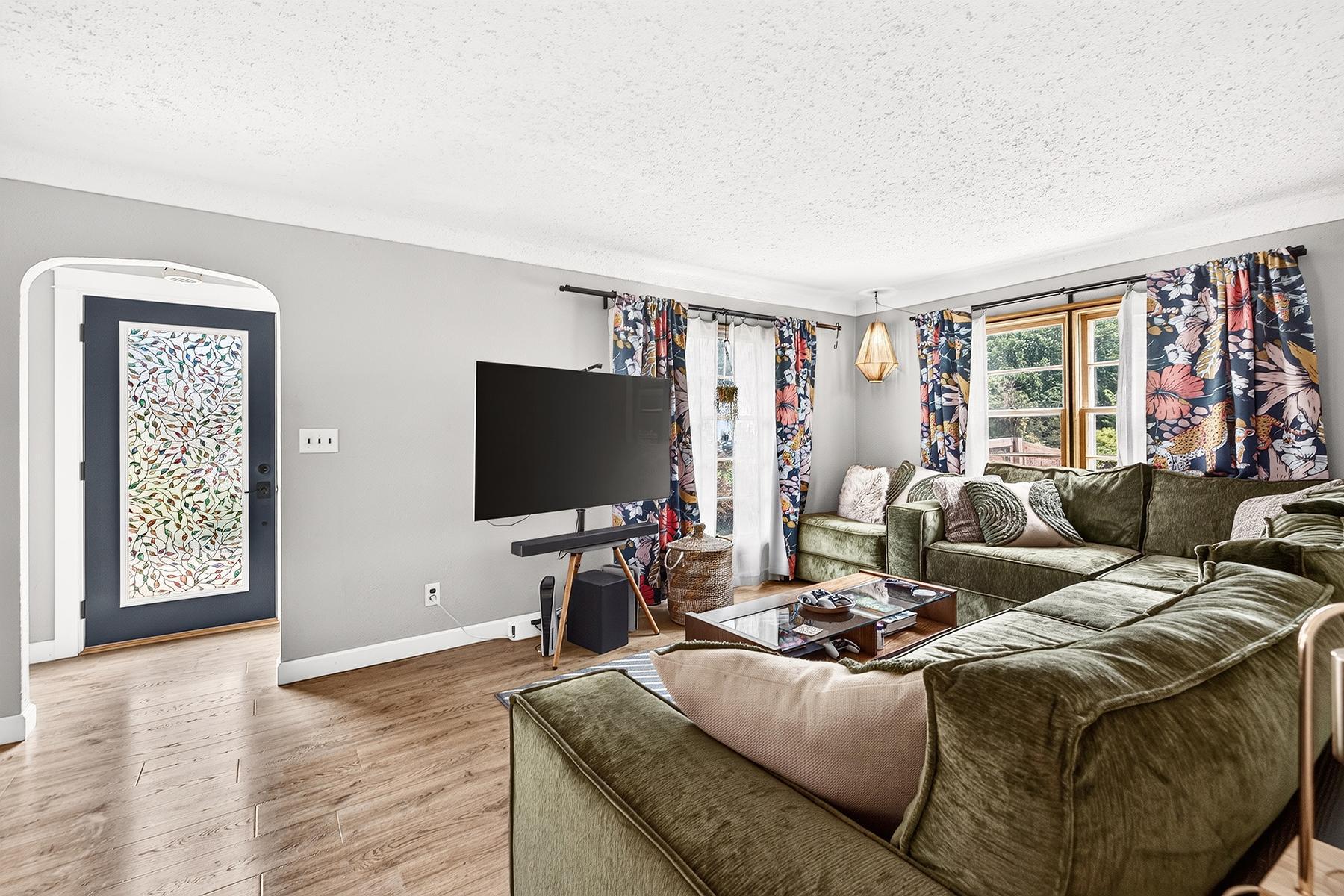 Living room off front entry is bright and inviting