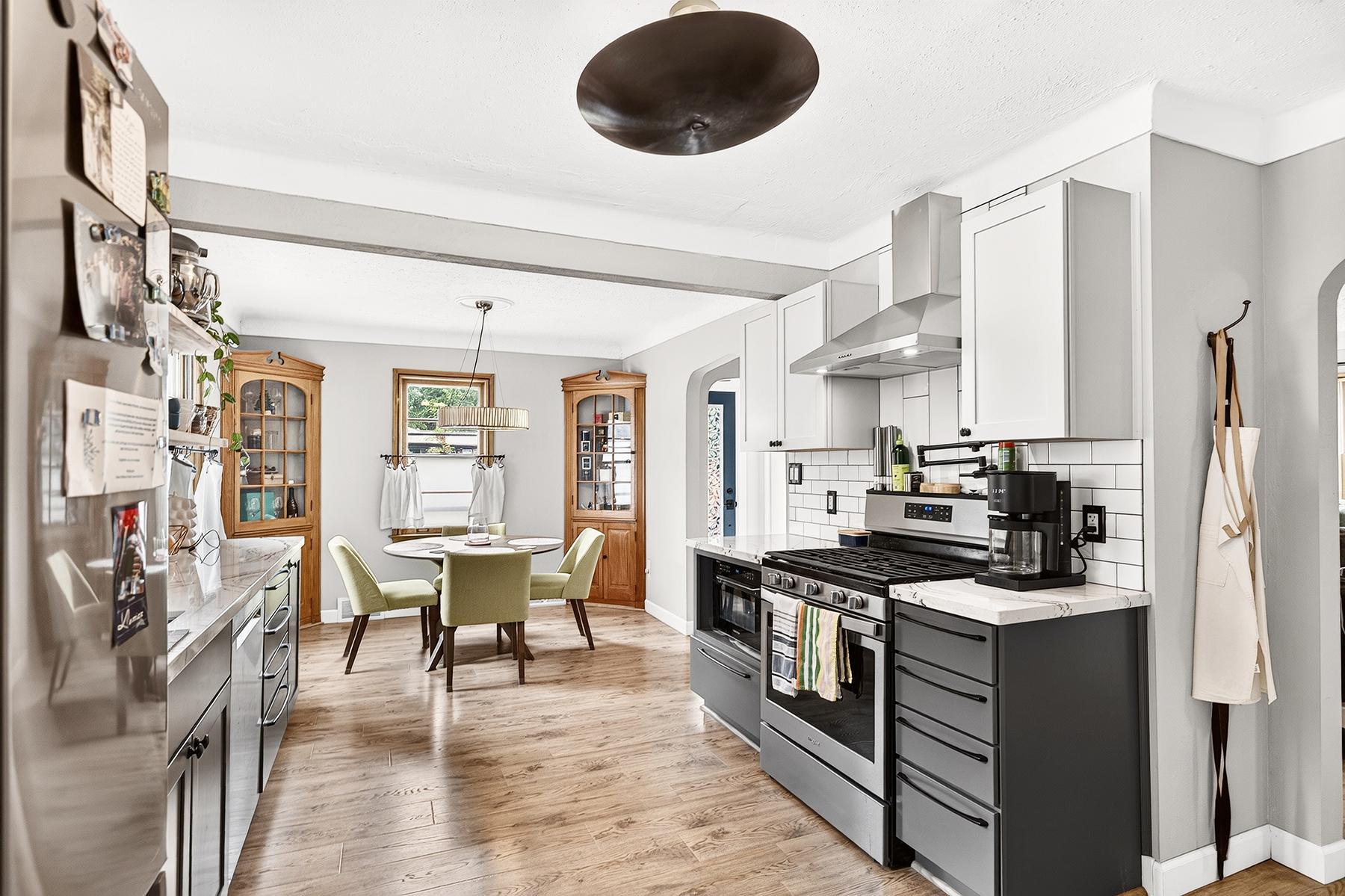 Dining area off kitchen is bright and cozy